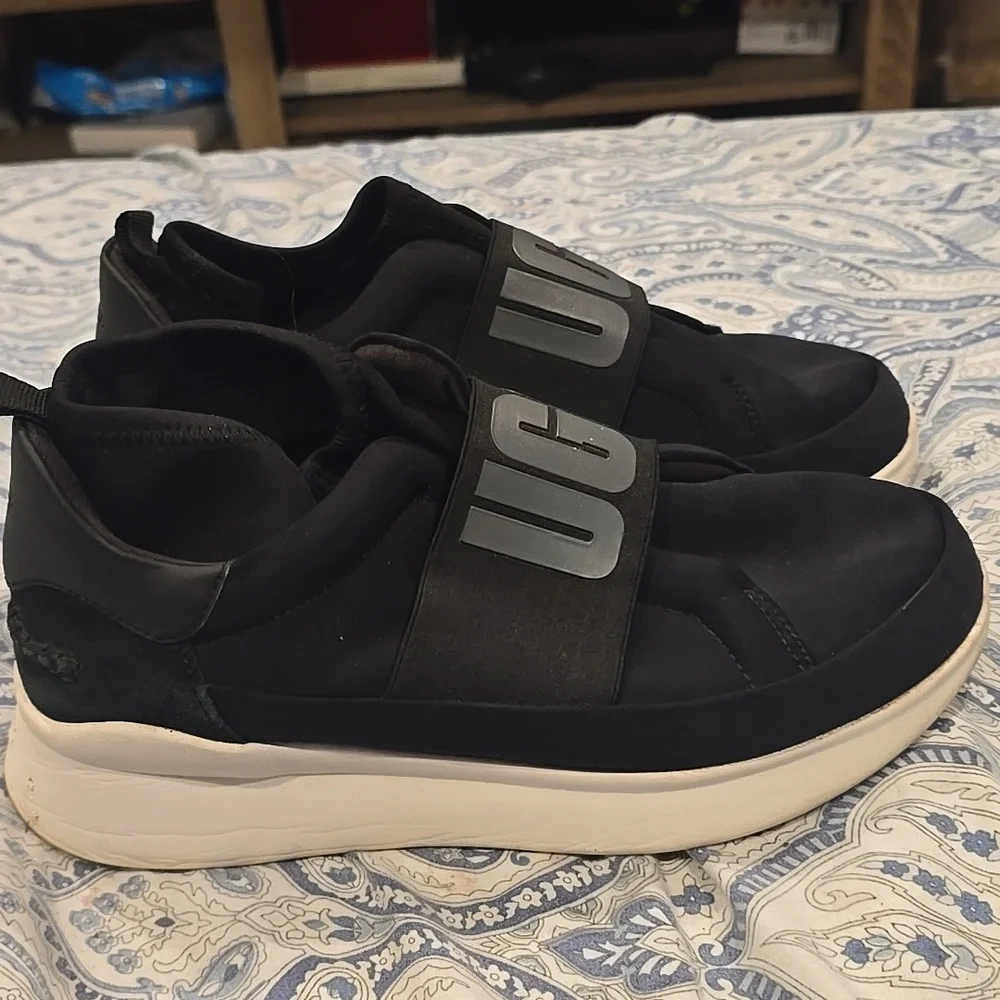 Like New UGG Black Slip-On Shoes with Logo Strap